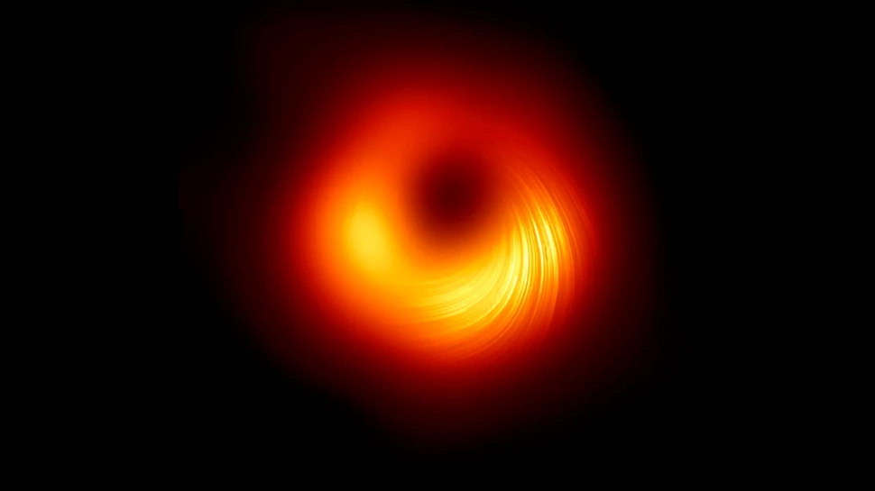 Noi imagini dezvăluie câmpul magnetic extrem de puternic al găurii negre din inima galaxiei Messier 87