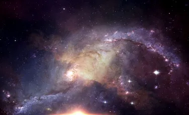 Astronomii au identificat cel mai timpuriu caz în care două galaxii fuzionează