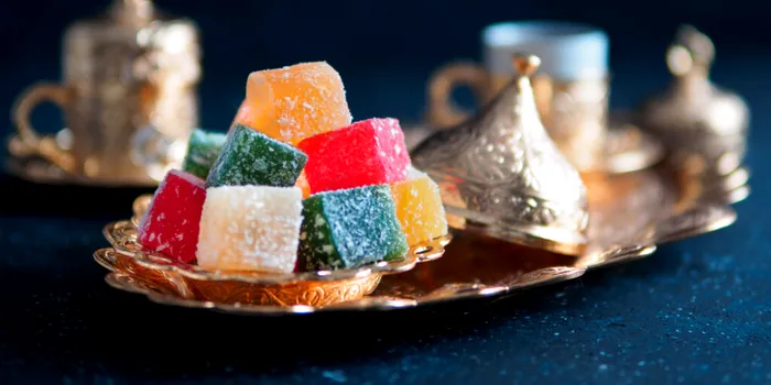 Cine a inventat bomboanele? De la dulciurile cu miere din Egiptul antic la batoanele de ciocolată moderne