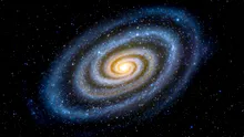 Telescopul Webb a descoperit cea mai îndepărtată galaxie, asemănătoare cu a noastră, din Universul timpuriu