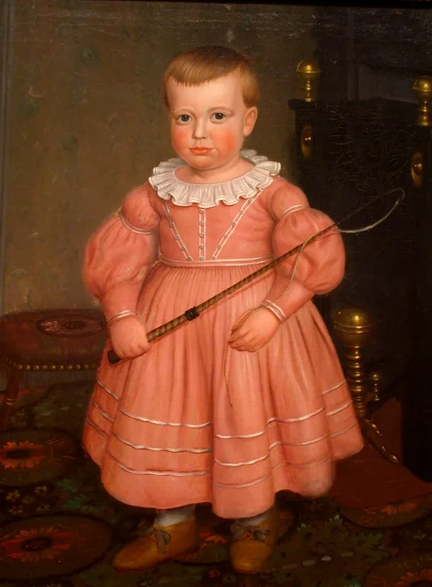 ”Băieţaş cu bici”, şcoala americană, cca. 1840. După cum se pare, nu era câtuşi de puţin nepotrivită, la acea epocă, îmbrăcarea unui băieţel  cu o rochiţă roz. 