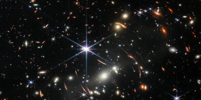 Telescopul Webb a fotografiat o galaxie care conține cele mai vechi stele din Univers