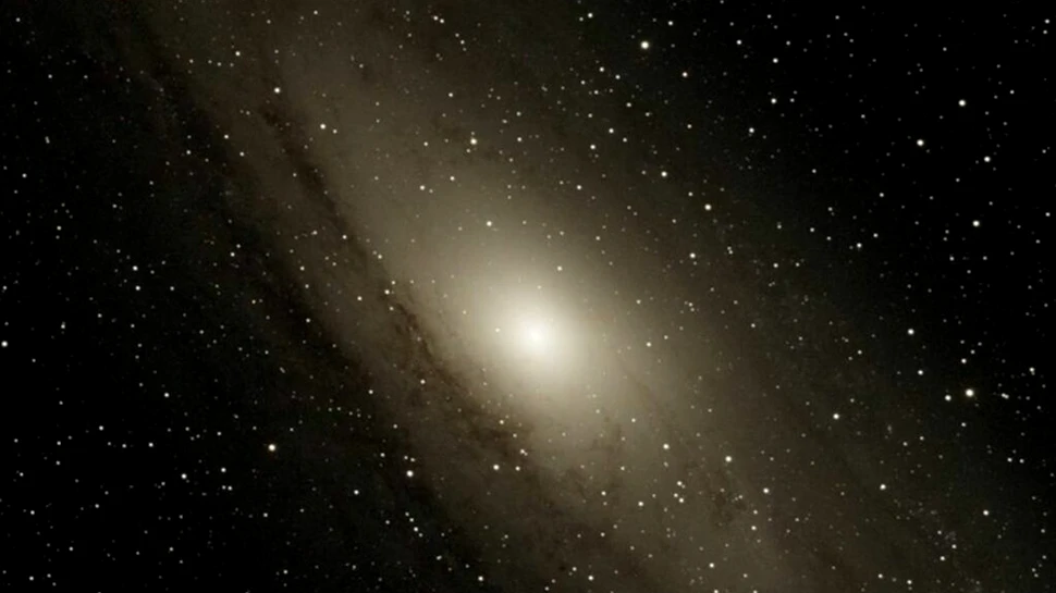 Astronomii dezvăluie rămășițele istoriei violente a Andromedei, marea galaxie vecină