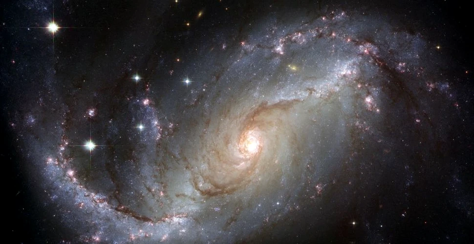 Astronomii au fotografiat, în premieră, un jet de gaze eliberat de coliziunea a două galaxii