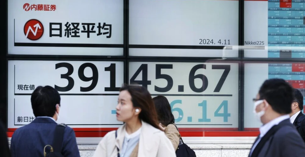 Yenul japonez a atins minimul ultimilor 34 de ani