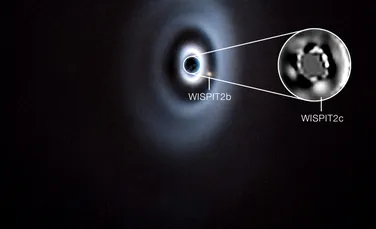 Un sistem solar în devenire? Două planete, surprinse în formare în discul unei stele tinere