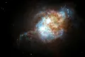 O descoperire rară și neașteptată. Hubble a surprins un quasar dublu în Universul îndepărtat