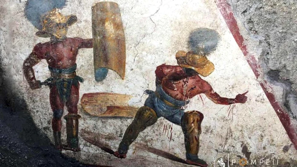 O frescă cu doi gladiatori în timpul luptei, descoperită în Pompeii