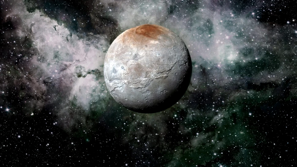 Luna lui Pluto are un pol nordic roșiatic și misterios, iar cercetătorii ar fi aflat, în sfârșit, de ce