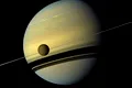 Titan se îndepărtează de Saturn de 100 de ori mai rapid față de estimările cercetătorilor