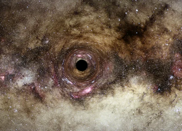 Astronomii au găsit una dintre cele mai mari găuri negre descoperite vreodată
