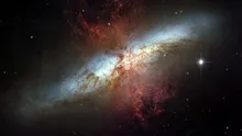 Telescopul Hubble a observat o galaxie care formează stele de 10 ori mai rapid decât Calea Lactee