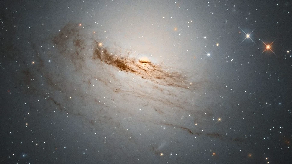 O fotografie uimitoare făcută de Hubble dezvăluie o galaxie aflată pe moarte