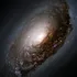 Strălucirea misterioasă din galaxia spirală Messier 64 a fost explicată de astronomi