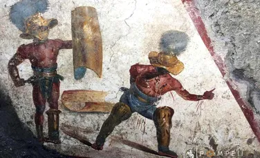 O frescă cu doi gladiatori în timpul luptei, descoperită în Pompeii