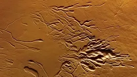 Unul dintre cei mai înalți vulcani de pe Marte ascunde prăpăstii și fisuri uimitoare