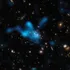 Astronomii au asistat la nașterea unui roi de galaxii îndepărtat din Universul timpuriu