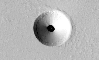 Ce s-ar putea ascunde într-o gaură uriașă de pe suprafața planetei Marte?