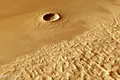 Un ocean înconjura cândva cel mai înalt vulcan din Sistemul Solar