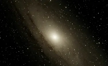 Astronomii dezvăluie rămășițele istoriei violente a Andromedei, marea galaxie vecină