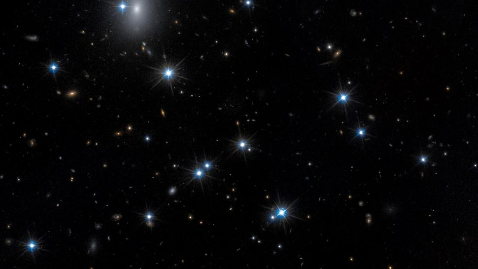 Telescopul Hubble a depistat o galaxie aproape invizibilă
