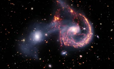 O coliziune galactică la 465 de milioane de ani-lumină depărtare de Pământ, observată cu Telescopul Webb