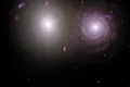 Secretele unei perechi de galaxii, dezvăluite de Telescoapele Webb și Hubble