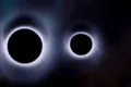 Astronomii au găsit 3 găuri negre supermasive pe punctul de a se ciocni