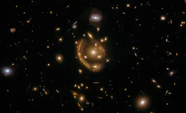 Trei sori alimentați de materie întunecată, descoperiți la începuturile Universului