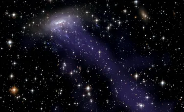 Astronomii au observat o galaxie cu tentacule de pe vremea când Universul era mult mai tânăr