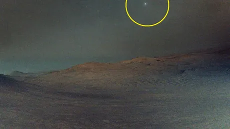 Unul dintre cei doi sateliți naturali ai lui Marte, fotografiat chiar de pe suprafața marțiană