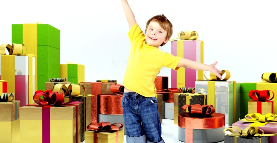Ce se întâmplă cu copiii care primesc foarte multe daruri de Crăciun?