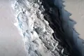 Cocluziile NASA: „Lipiciul” înghețat poate controla ritmul de rupere a raftului de gheață din Antarctica