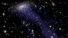 Astronomii au observat o galaxie cu tentacule de pe vremea când Universul era mult mai tânăr