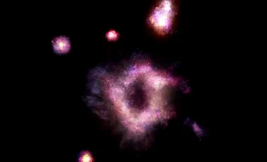 Astronomii au descoperit un „inel de foc” antic care încă ne mai privește. Galaxia arată precum „Ochiul lui Sauron”