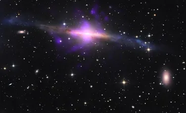 O gaură neagră supermasivă a fost înclinată de un eveniment misterios