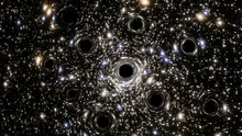 Astronomii ar fi găsit în sfârșit găurile negre „lipsă” ale Universului